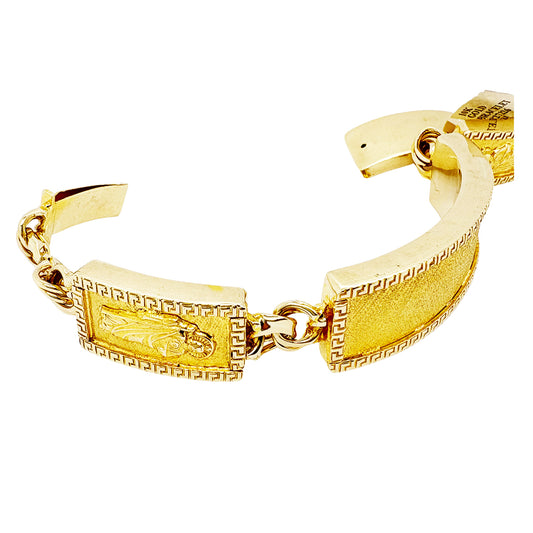 CHINO BRACELET WITH ST. JUDE ON TWO PLATES AND GREEK KEY BORDER ON ALL THREE PLATES, CENTER PLATE PLAIN 56.00 GM