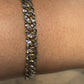 SOLID MIAMI CUBAN BRACELET WITH RHODIUM DIAMOND CUTS 24.90 GM