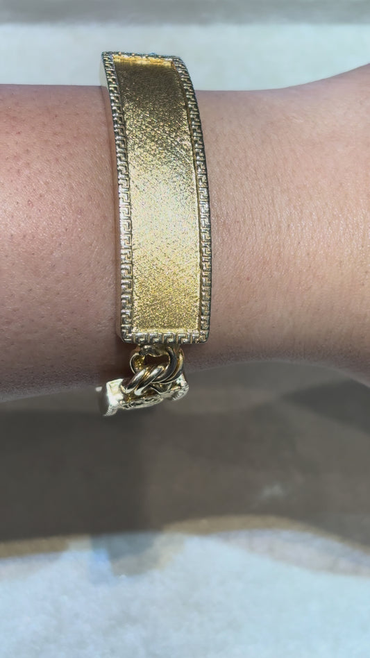 CHINO BRACELET WITH ST. JUDE ON TWO PLATES AND GREEK KEY BORDER ON ALL THREE PLATES, CENTER PLATE PLAIN 57.10 GM