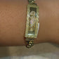 SEMI SOLID CHINO BRACELET WITH GREEK KEY AND SAINT JUDE WITH CLEAR STONES  ON A PLATE 18.40 GM