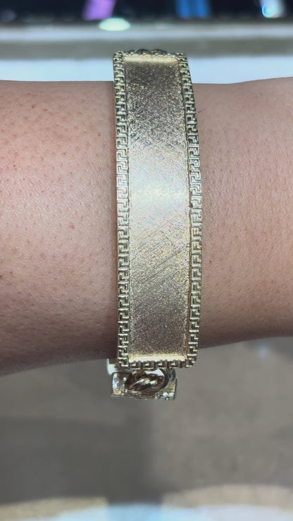 CHINO BRACELET WITH SANTA MUERTE ON TWO PLATES AND GREEK KEY BORDER ON ALL THREE PLATES, CENTER PLATE PLAIN ED05550